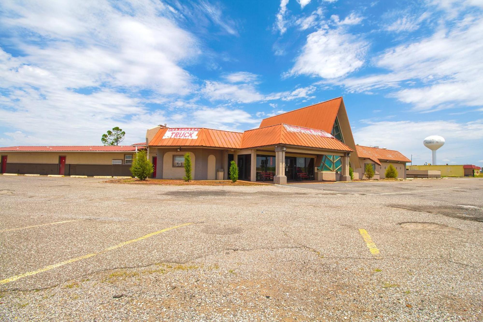 American Best Inn By Oyo I-35 Perry Near Lake Mcmurtry Exterior photo